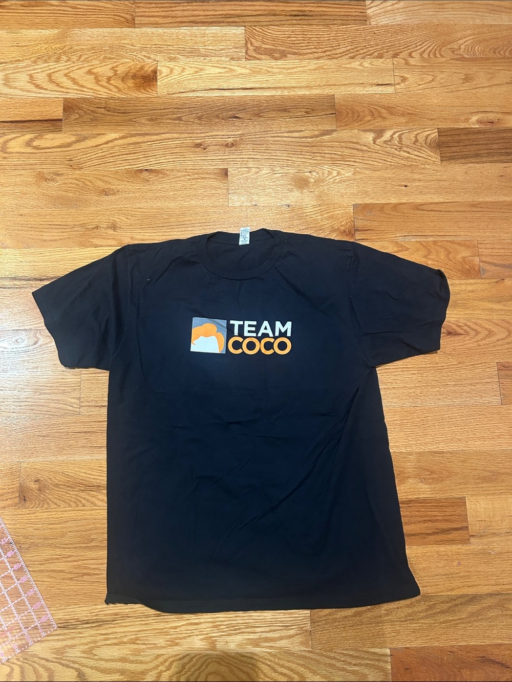 Anvil Black T-Shirt with Orange and White Team Coco Logo